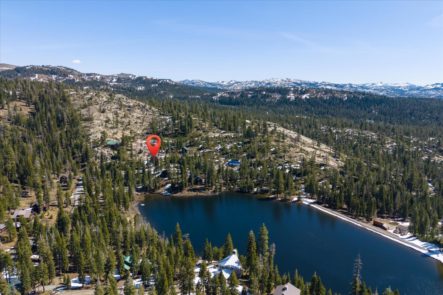 110 Flynn Road Bear Valley, CA 95223 - Photo 4 of 56 a view of a lake with a mountain in the background