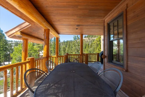 a aerial view of a house with a yard