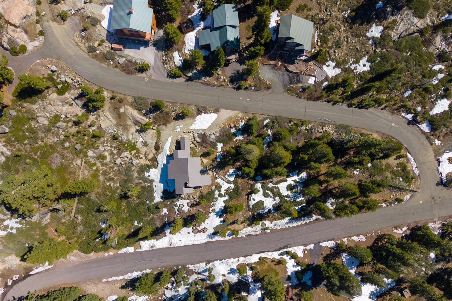 110 Flynn Road Bear Valley, CA 95223 - Photo 52 of 56 an aerial view of a house with a lot of flowers and yard