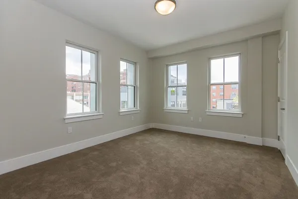 an empty room with windows