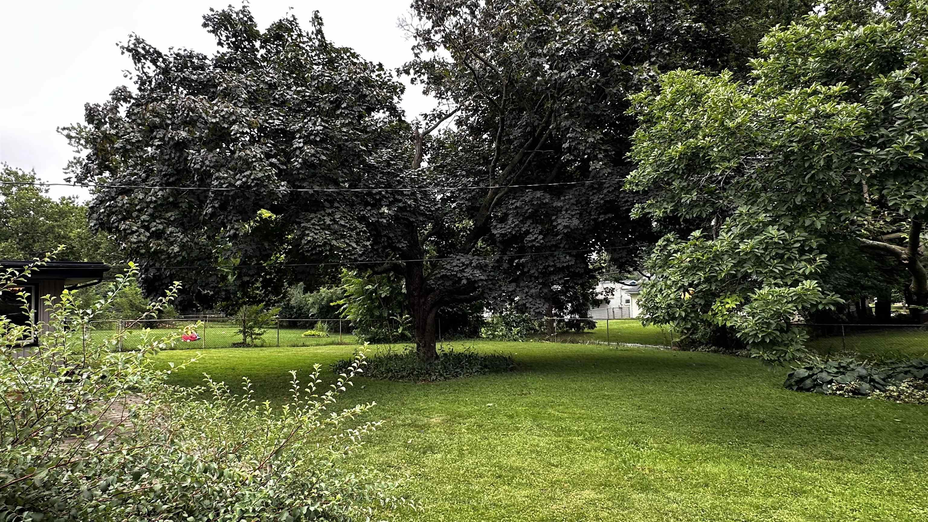 4721 Highcrest Road Rockford, IL 61107 - Photo 16 of 22 a view of a park with large trees