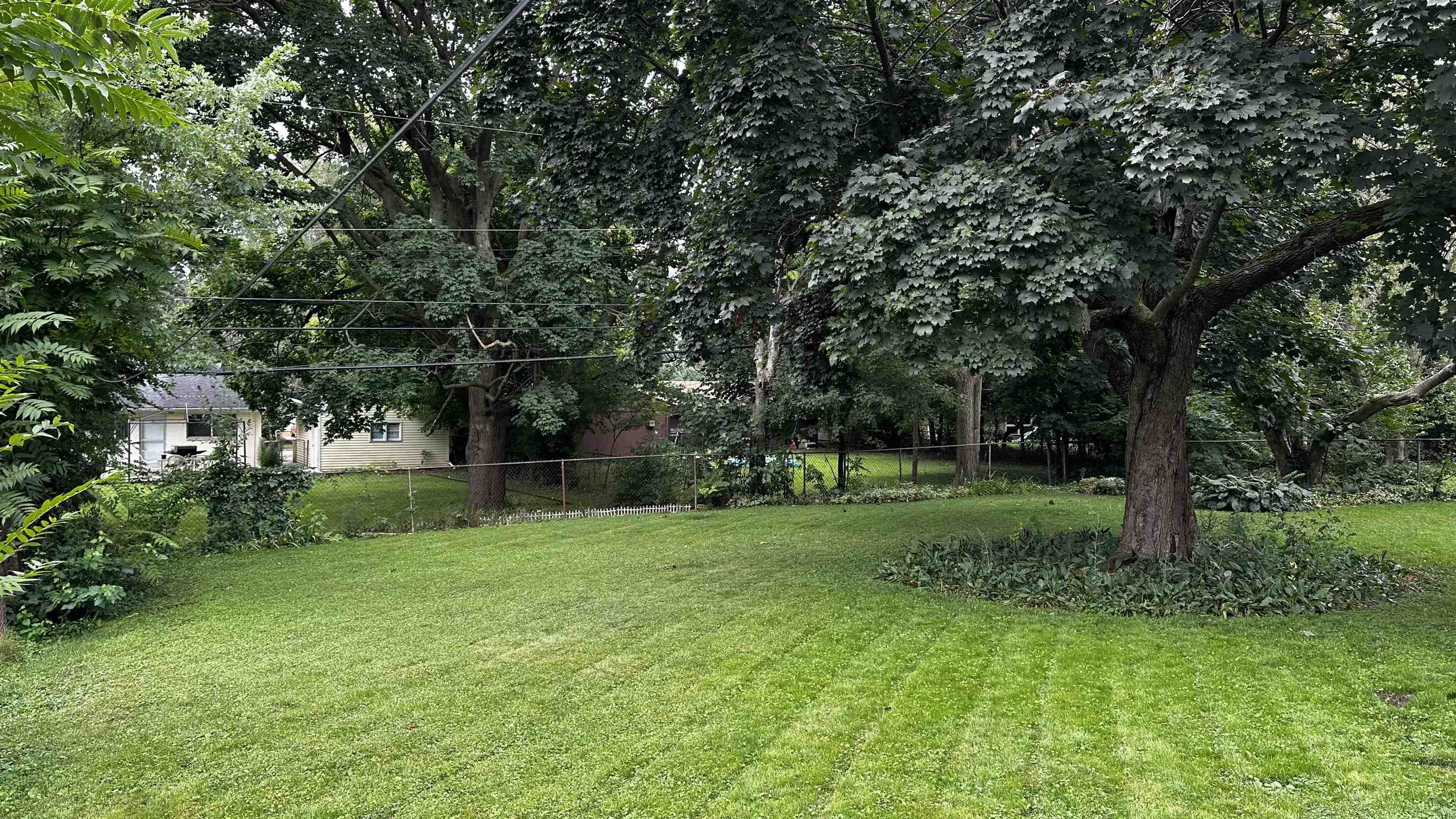 4721 Highcrest Road Rockford, IL 61107 - Photo 17 of 22 a view of a tree in a yard