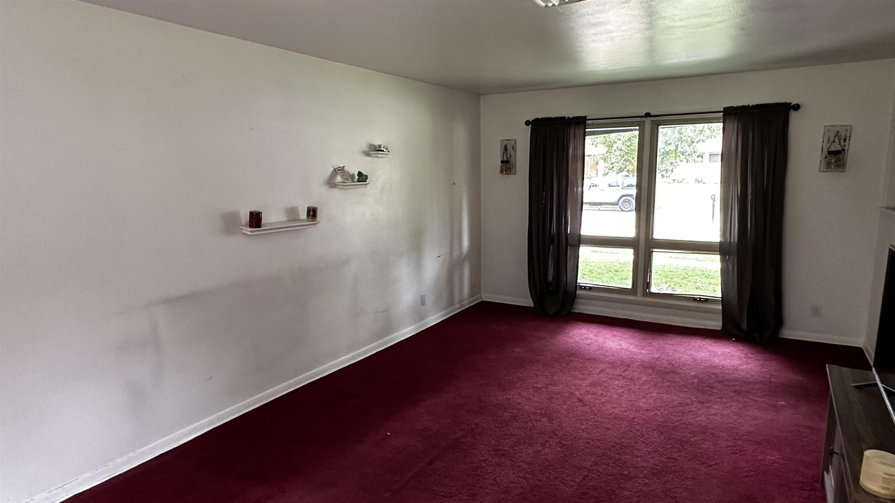 4721 Highcrest Road Rockford, IL 61107 - Photo 5 of 22 an empty room with windows