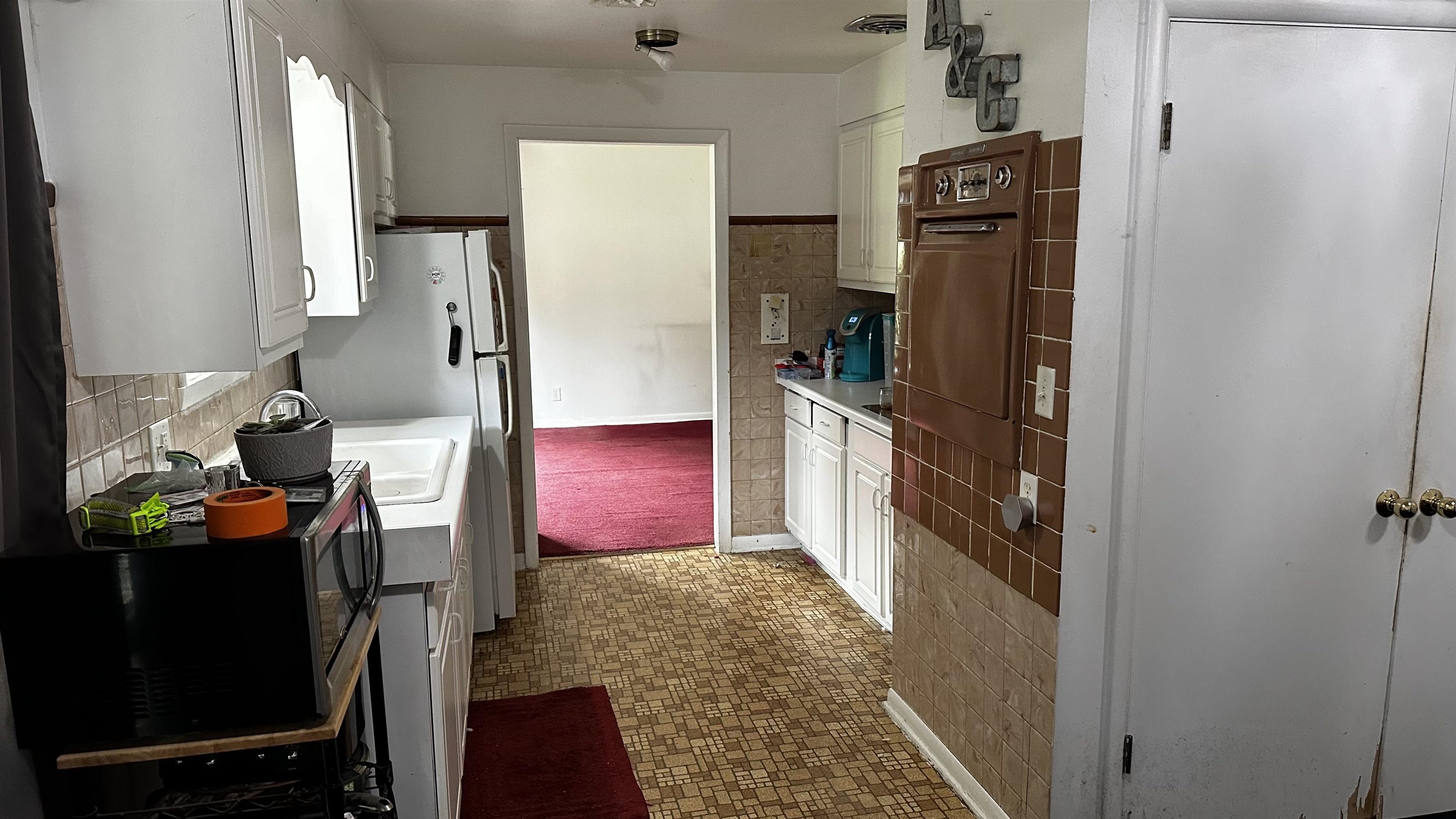 4721 Highcrest Road Rockford, IL 61107 - Photo 8 of 22 a kitchen with stainless steel appliances a refrigerator and a stove