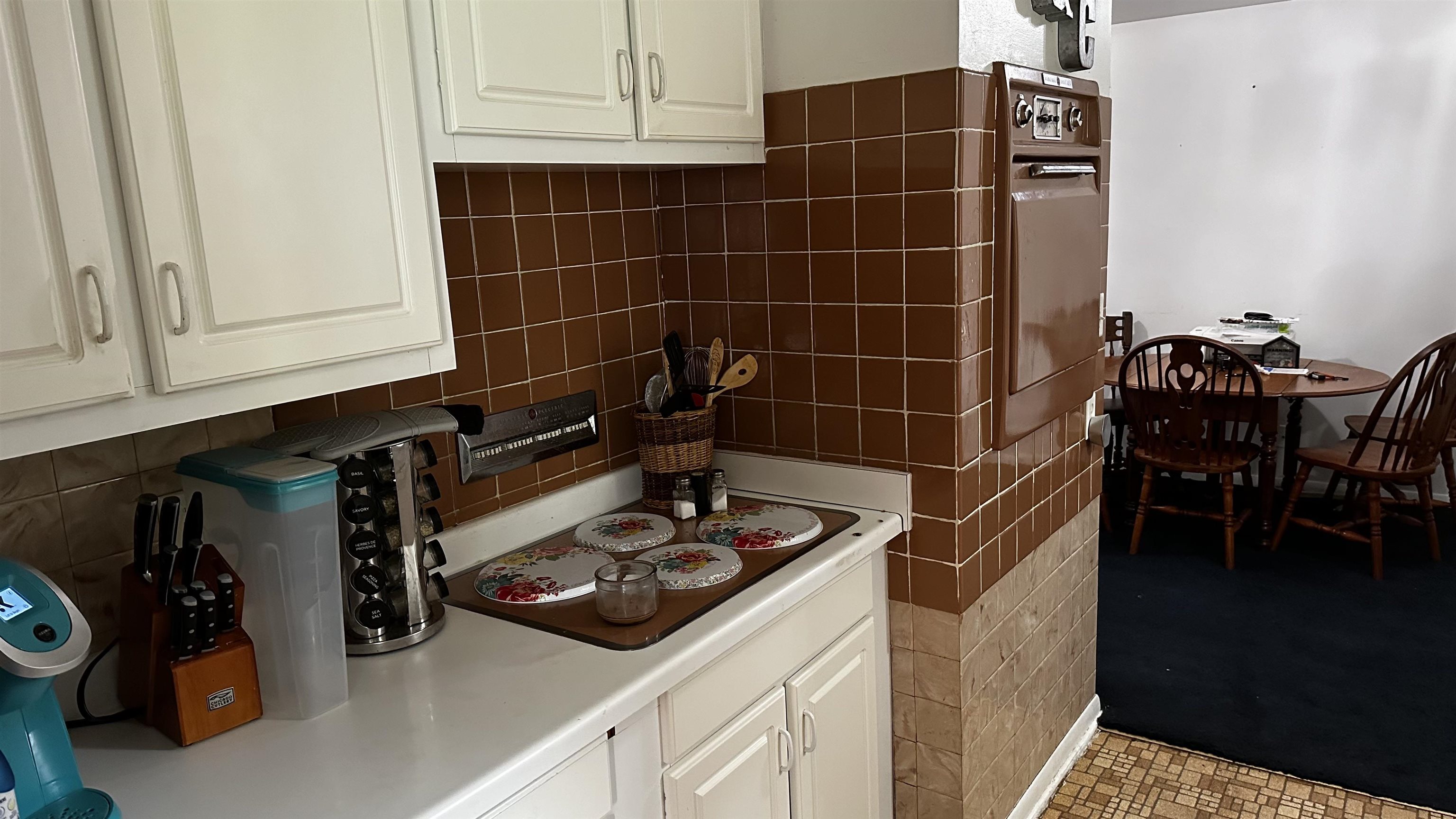 4721 Highcrest Road Rockford, IL 61107 - Photo 9 of 22 a kitchen with a sink and cabinets