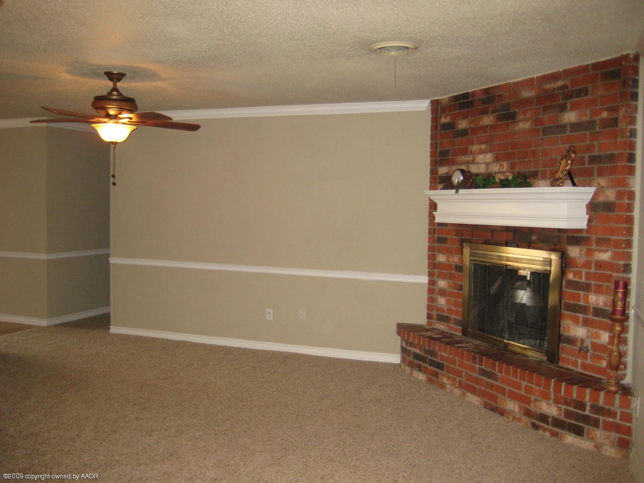 5214 Royce Drive Amarillo, TX 79110 - Photo 6 of 13 Living Room with Fireplace
