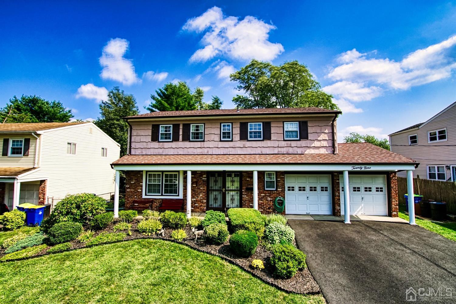 29 Surrey Road Somerset, NJ 08873 - Photo 1 of 18 front view of a house with a yard