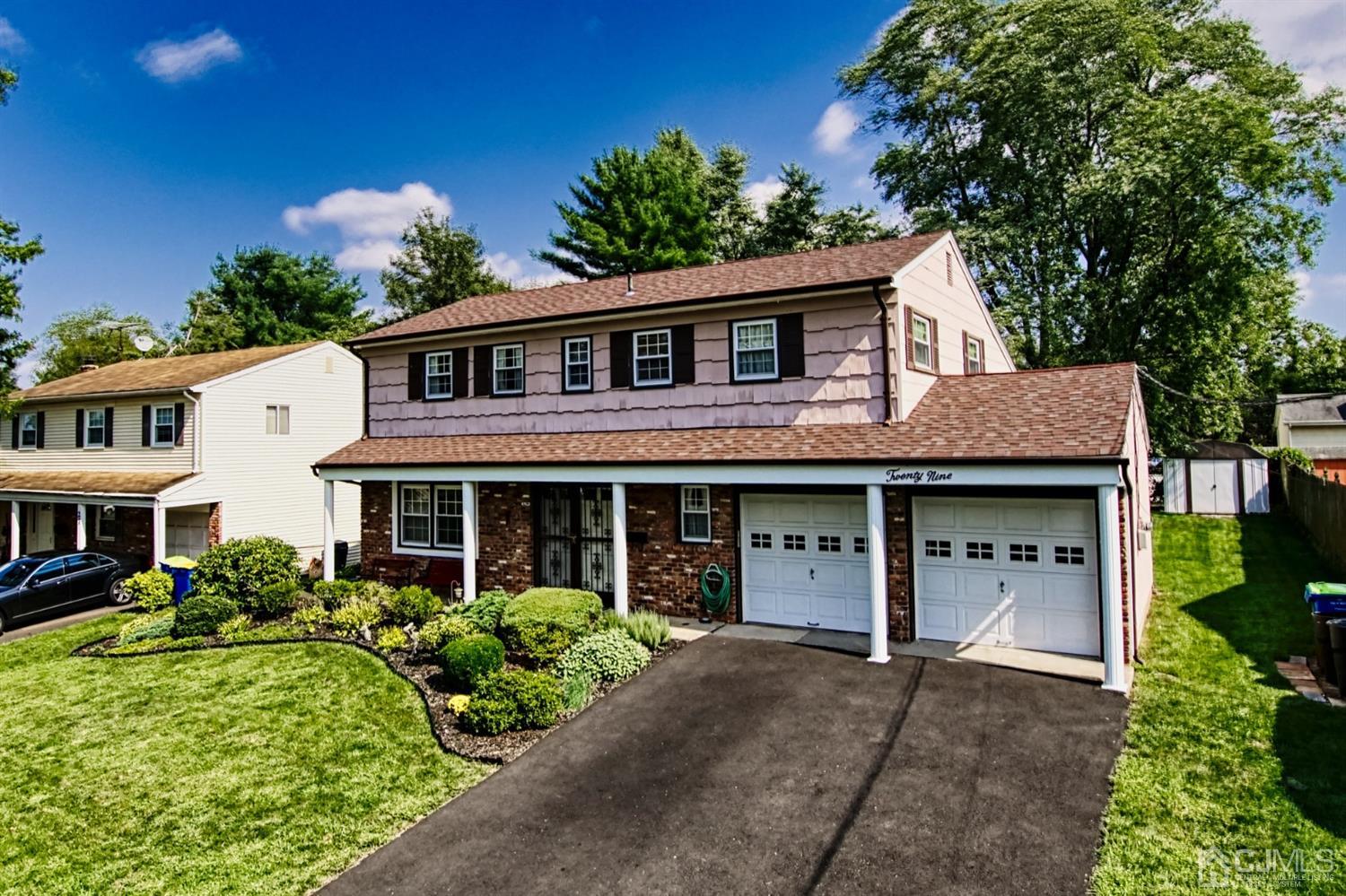 29 Surrey Road Somerset, NJ 08873 - Photo 3 of 18 a front view of a house with a garden