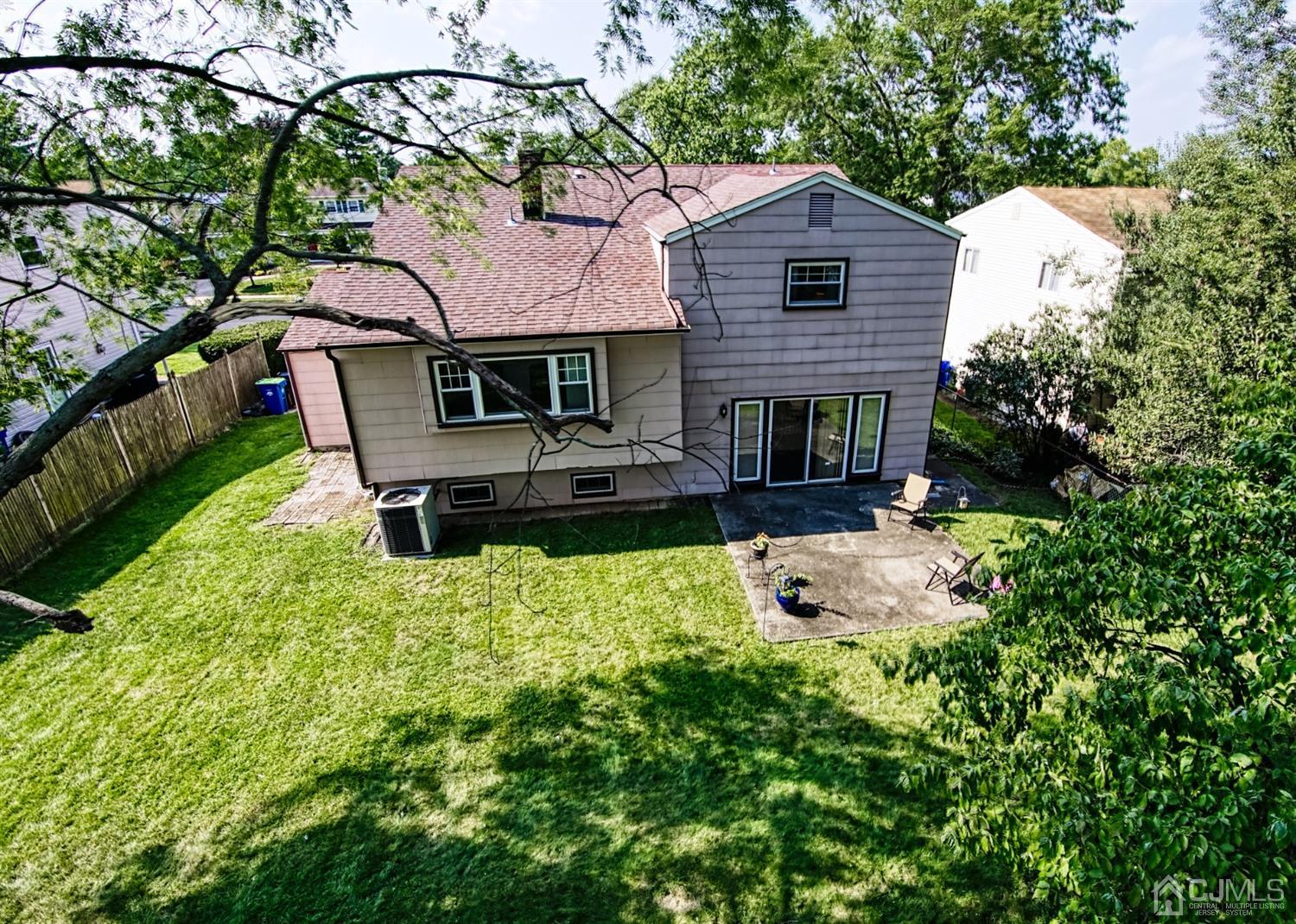 29 Surrey Road Somerset, NJ 08873 - Photo 5 of 18 a front view of a house with swimming pool
