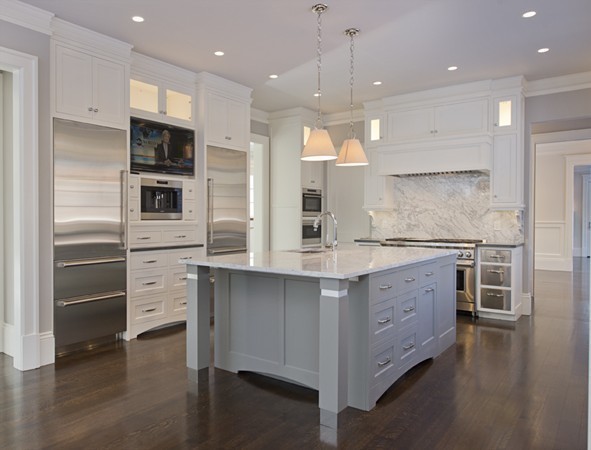 1 Green Lane Weston, MA 02493 - Photo 13 of 30 a kitchen with stainless steel appliances kitchen island granite countertop a stove a sink and a refrigerator