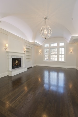 1 Green Lane Weston, MA 02493 - Photo 18 of 30 a view of an empty room with wooden floor and a window