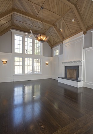 1 Green Lane Weston, MA 02493 - Photo 8 of 30 a view of an empty room with wooden floor and a window