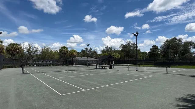 a view of a tennis ground with lots of swings and slides