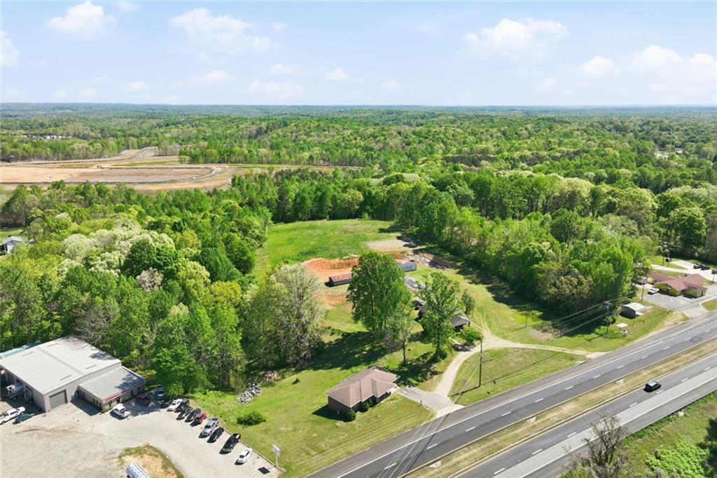 2475 Athens Highway Gainesville, GA 30507 - Photo 13 of 18 a view of a garden with a lake