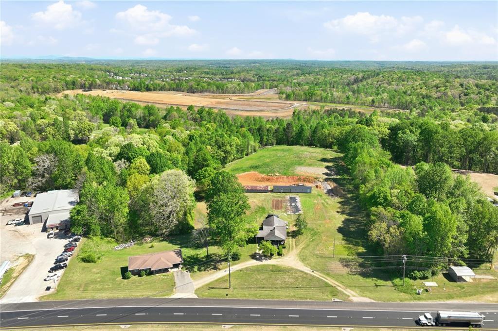 2475 Athens Highway Gainesville, GA 30507 - Photo 14 of 18 an aerial view of residential houses with outdoor space and street view