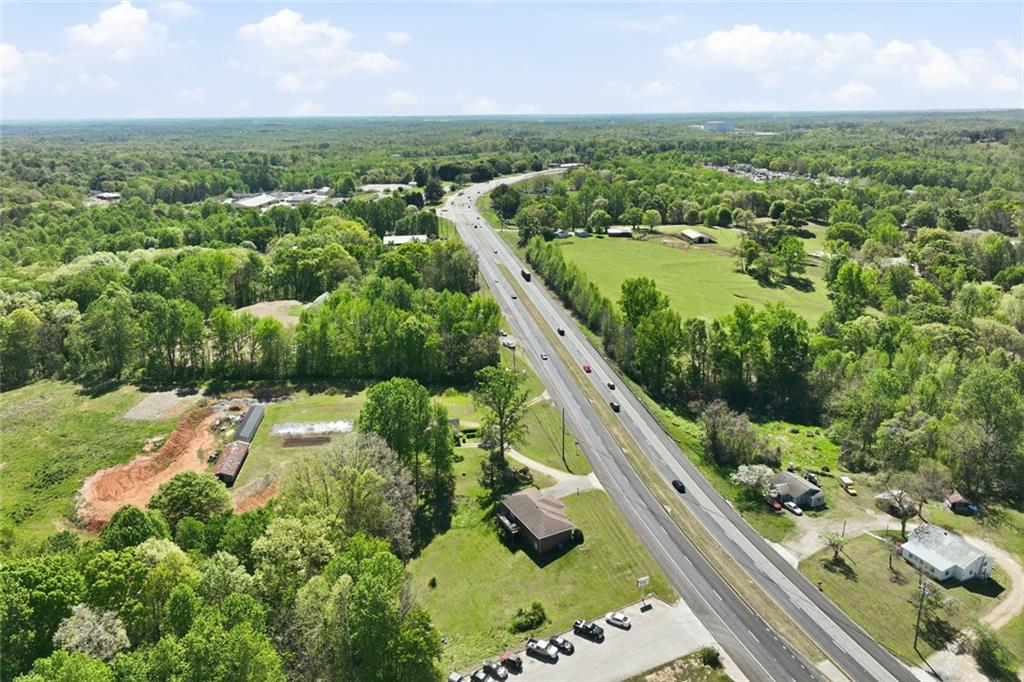 2475 Athens Highway Gainesville, GA 30507 - Photo 16 of 18 an aerial view of residential houses with outdoor space and river