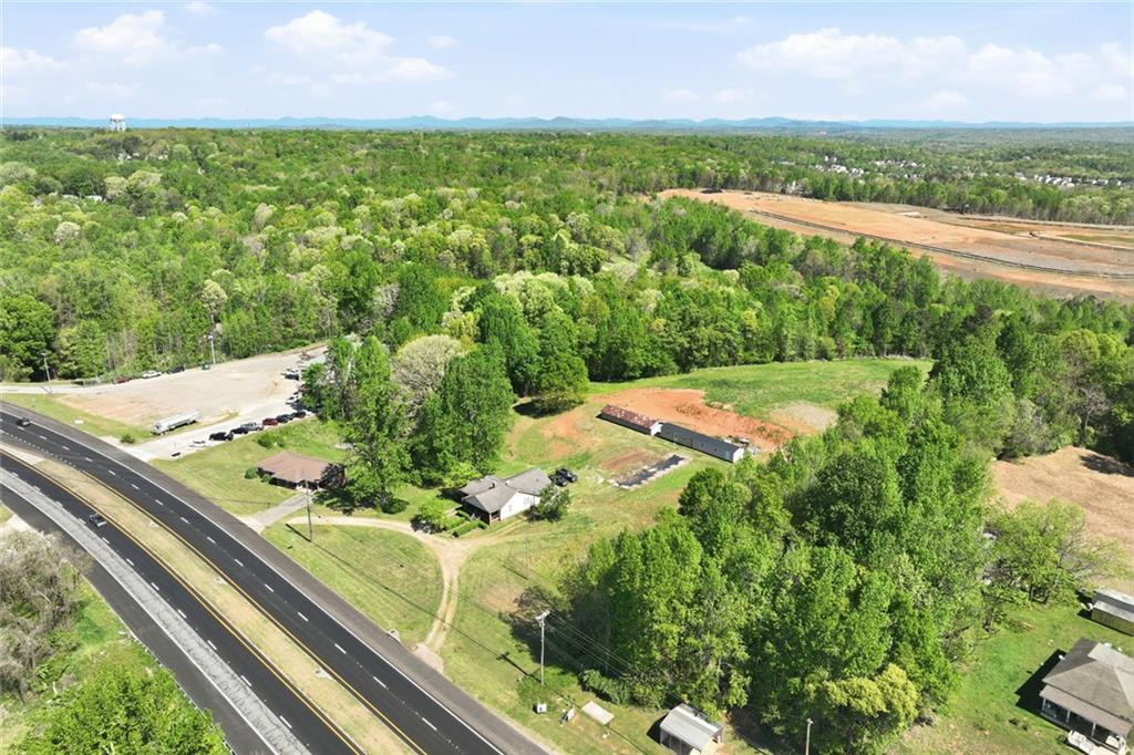 2475 Athens Highway Gainesville, GA 30507 - Photo 3 of 18 a view of a lake with a yard