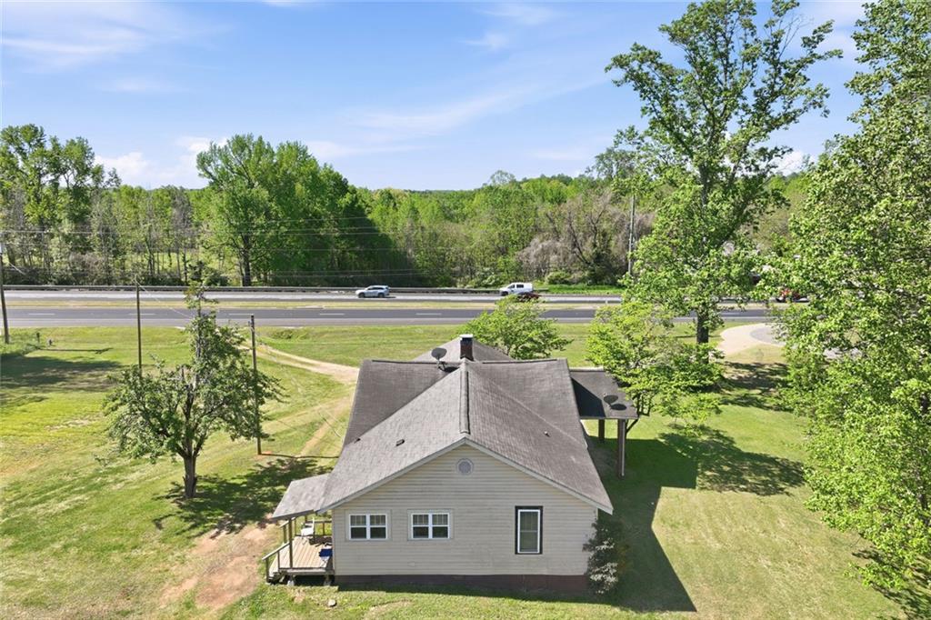 2475 Athens Highway Gainesville, GA 30507 - Photo 10 of 18 a view of a swimming pool with a yard