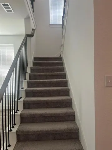 a white bath tub sitting in a bathroom