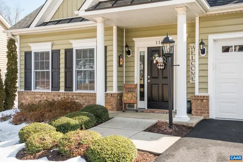 a view of a livingroom with furniture and wooden floor