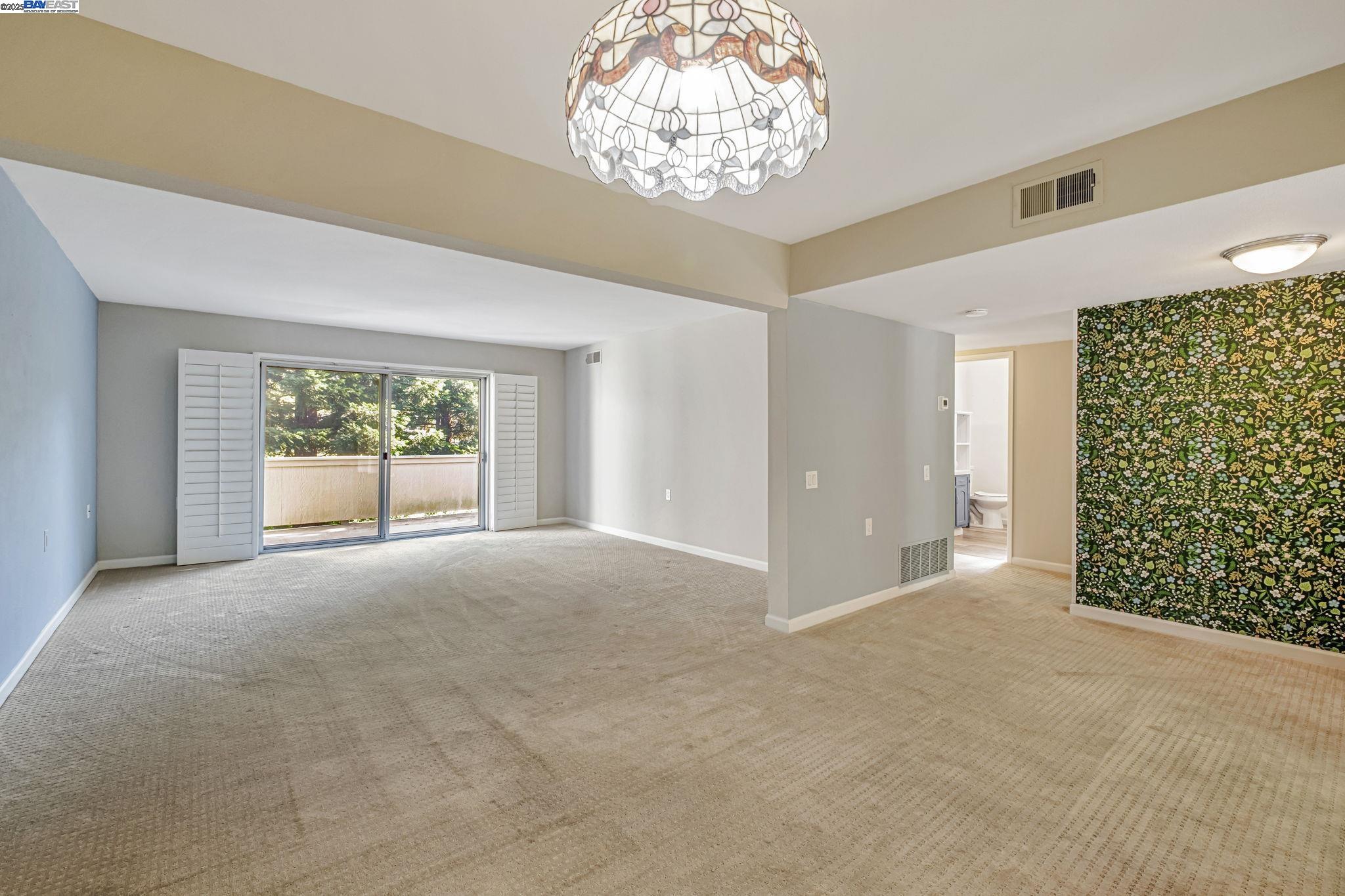 1400 Golden Rain Road, Unit 3 Walnut Creek, CA 94595 - Photo 12 of 29 a view of an empty room with a window