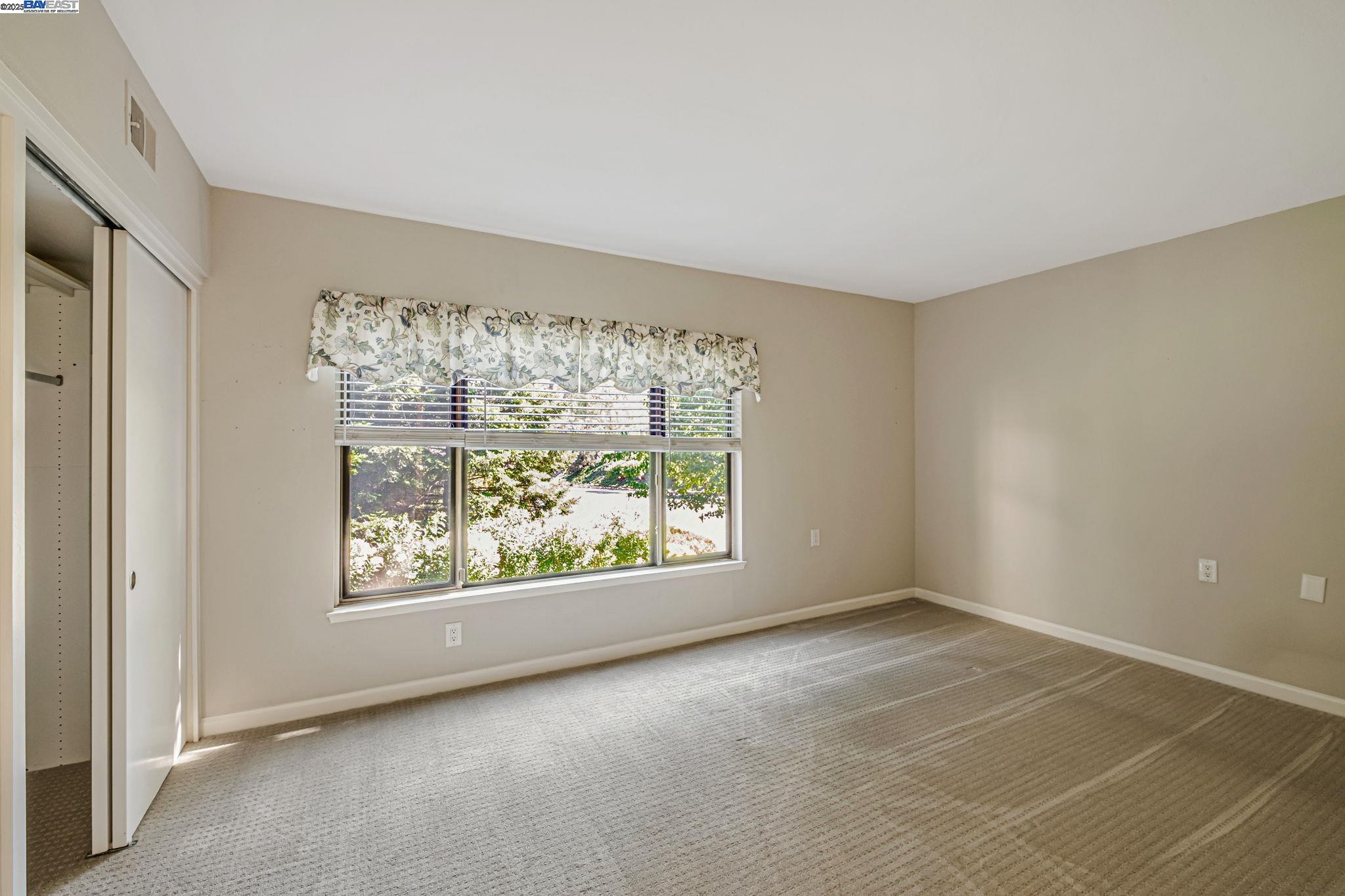 1400 Golden Rain Road, Unit 3 Walnut Creek, CA 94595 - Photo 16 of 29 an empty room with a window
