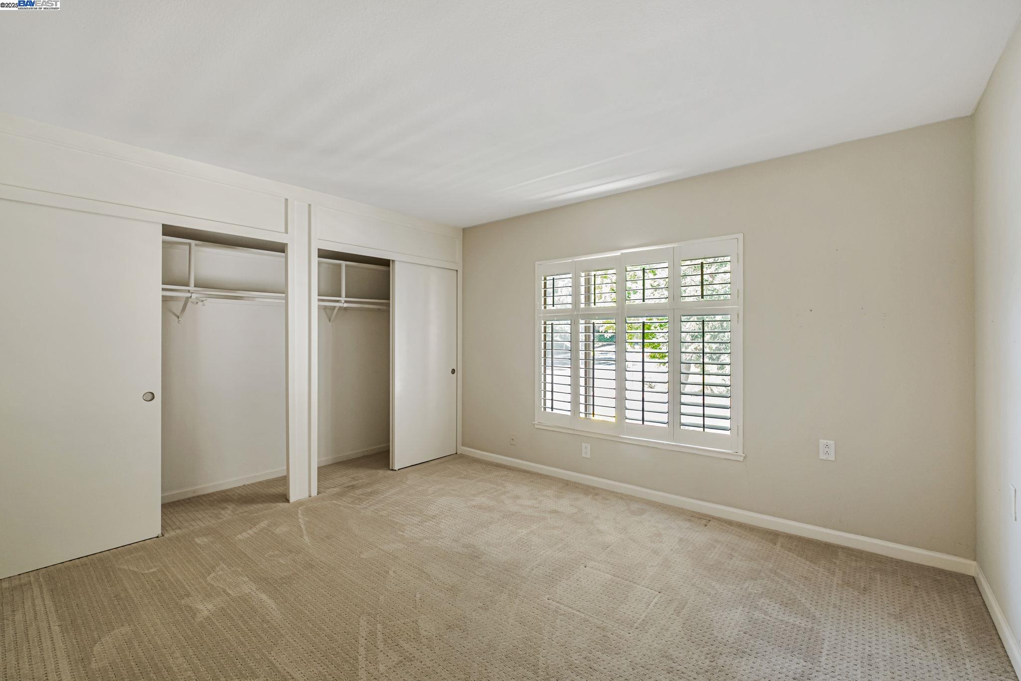 1400 Golden Rain Road, Unit 3 Walnut Creek, CA 94595 - Photo 18 of 29 a view of an empty room with a window
