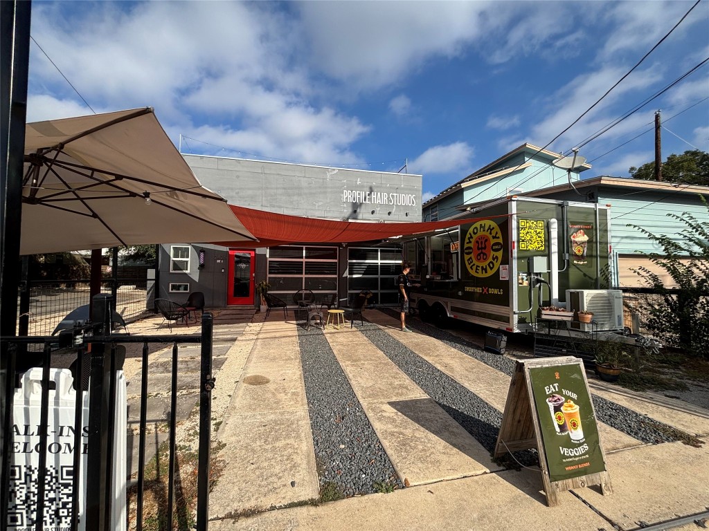 2307 Coronado Street Austin, TX 78702 - Photo 14 of 17 a view of a street with sitting area