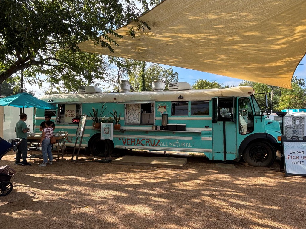 2307 Coronado Street Austin, TX 78702 - Photo 15 of 17 a view of a car park in front of house