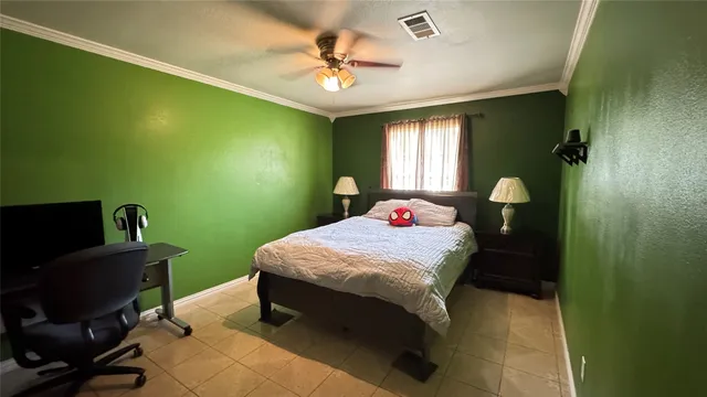 a bedroom with a bed and a table