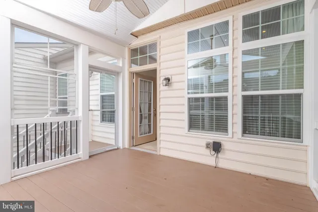 a front view of a house with a large window