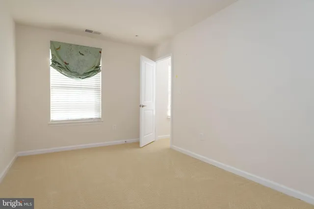 a room with a sink and gym equipment