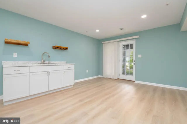 a view of house with yard and porch