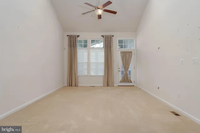 a view of a kitchen with a sink
