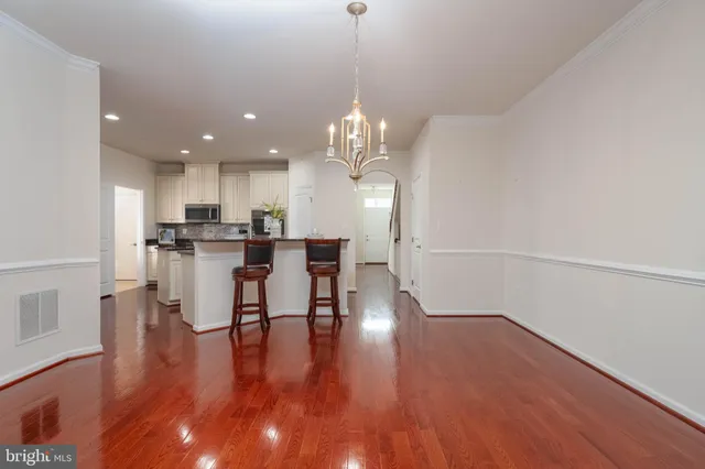 a view of a kitchen and dining room