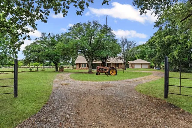 a house view with a garden space