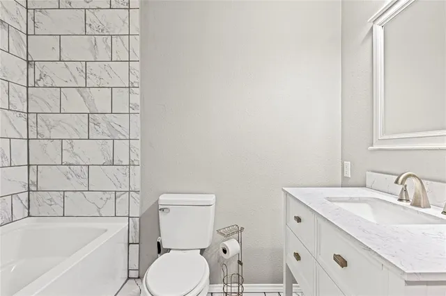 a spacious bedroom with a large bed and a window