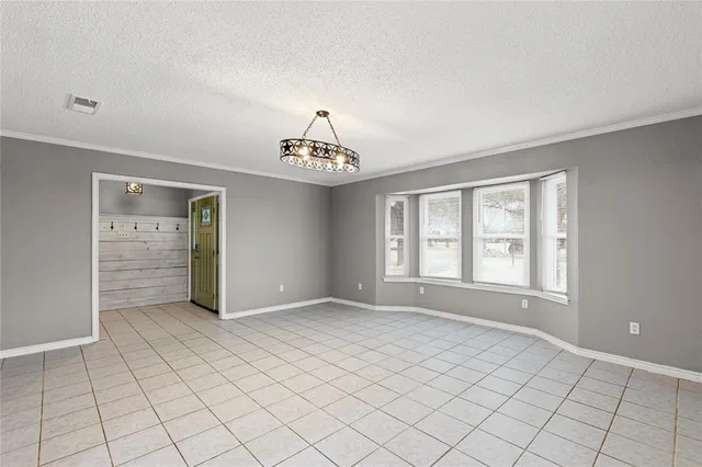 a view of an empty room with window