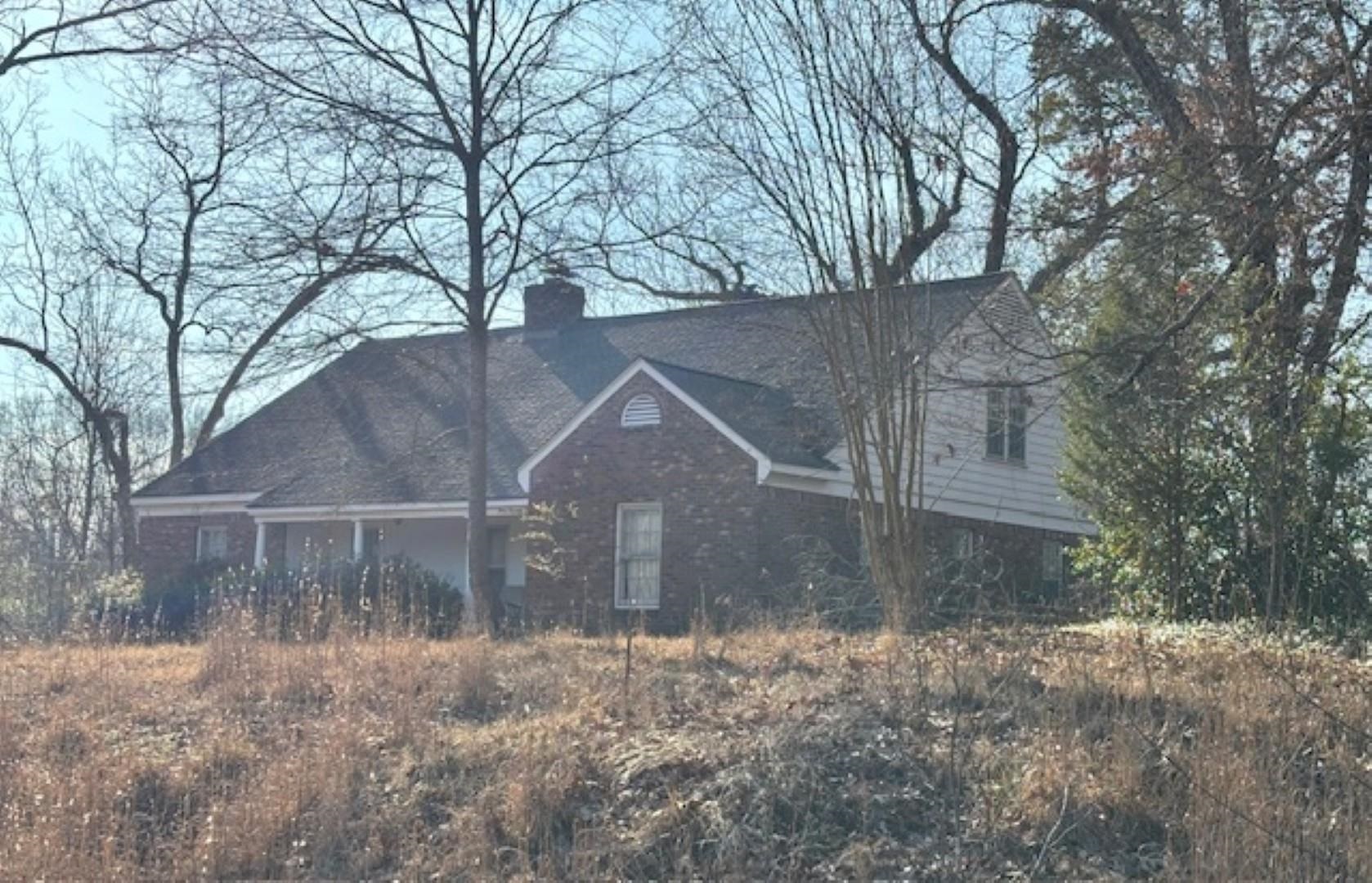 377 North Houston Levee Road Cordova, TN 38018 - Photo 2 of 19 a backyard of a house with lots of green space