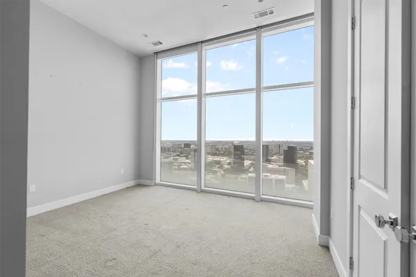 an empty room with windows