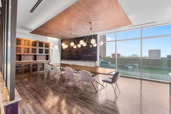 a patio with table and chairs