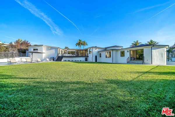 a view of a house with a big yard