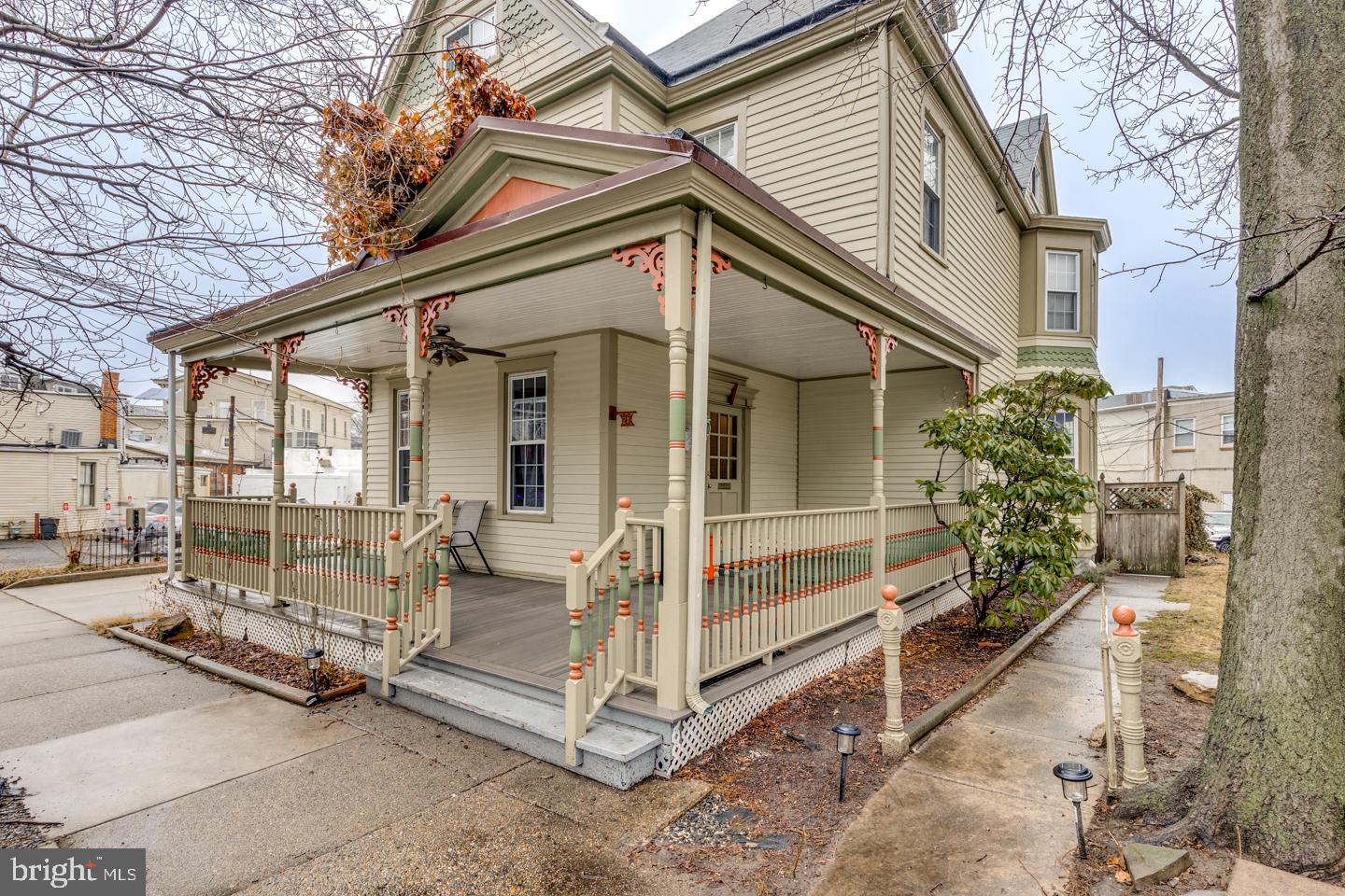 a view of a patio with a table and chairs