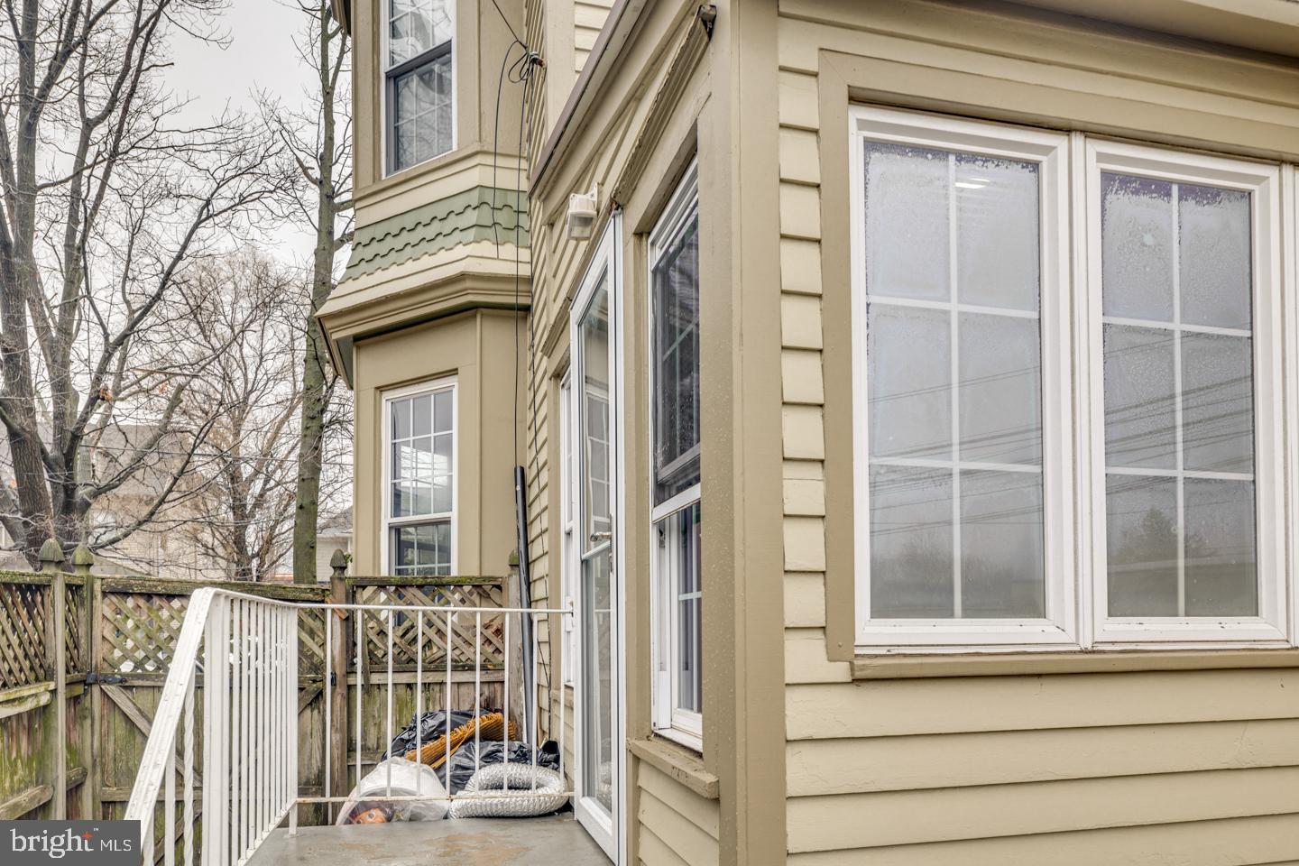 21 Ellis Street Haddonfield, NJ 08033 - Photo 22 of 23 a view of a house with a window and wooden fence