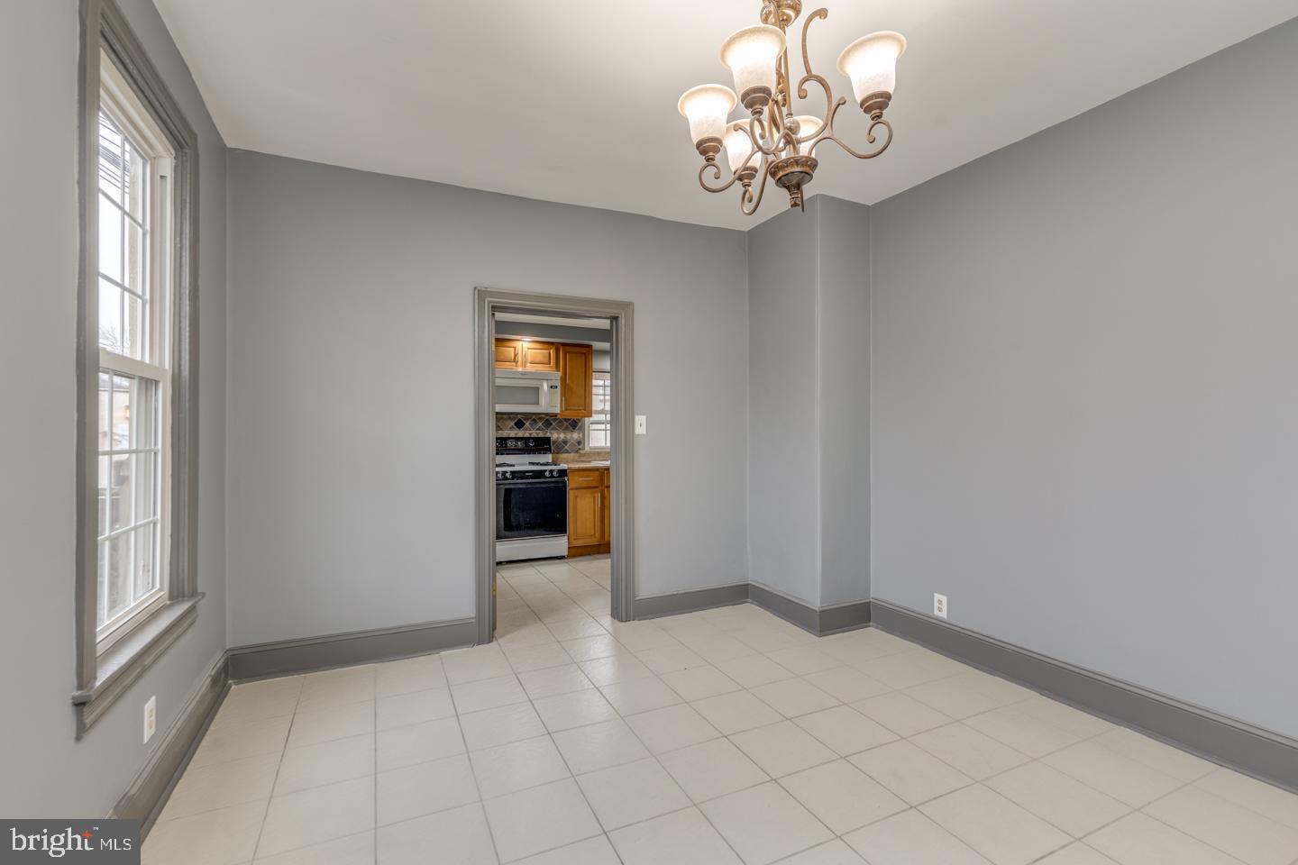 21 Ellis Street Haddonfield, NJ 08033 - Photo 9 of 23 wooden floor in an empty room with a window