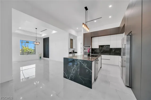 $975,000 | 2221 Southwest 5th Place, Cape Coral, FL 33991