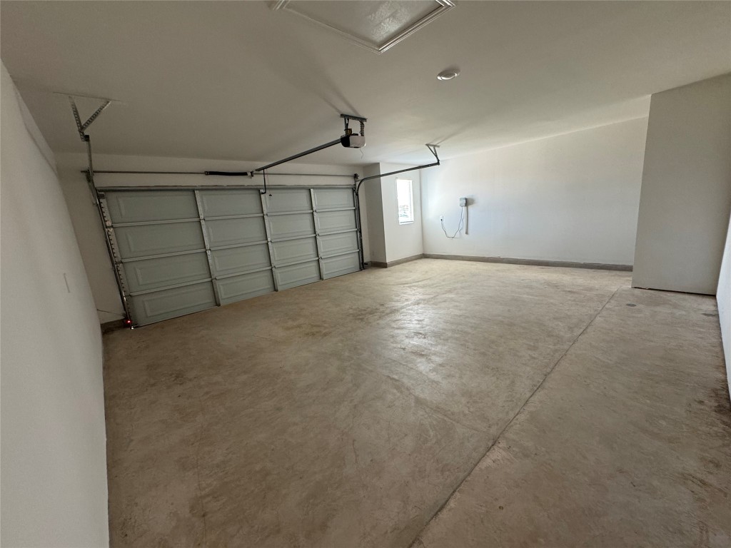 121 Tektite Terrace Kyle, TX 78640 - Photo 12 of 16 2.5 garage. Fits 2 cars and has more room for storage.