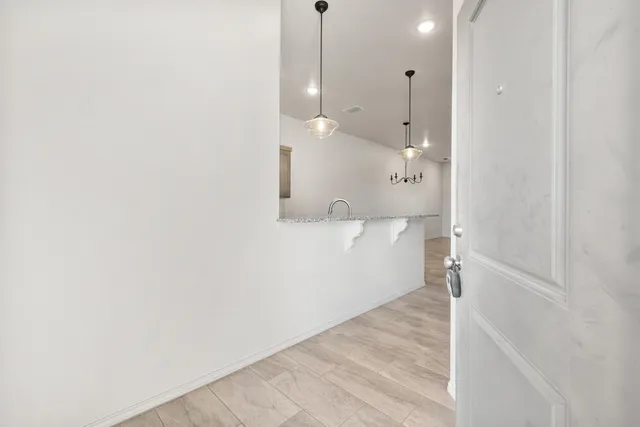 a view of a kitchen with a sink