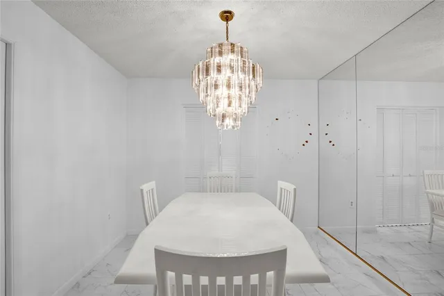 a very nice looking room with a chandelier