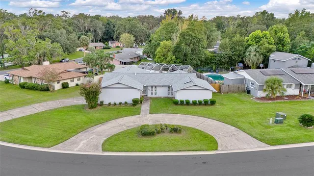 an aerial view of a house with garden